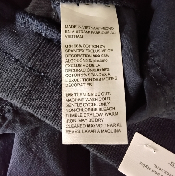 Chico's Women's O US 4 Navy Pull-on Eyelet Cutout Lace Hem Pockets Crop Pant - Picture 8 of 8